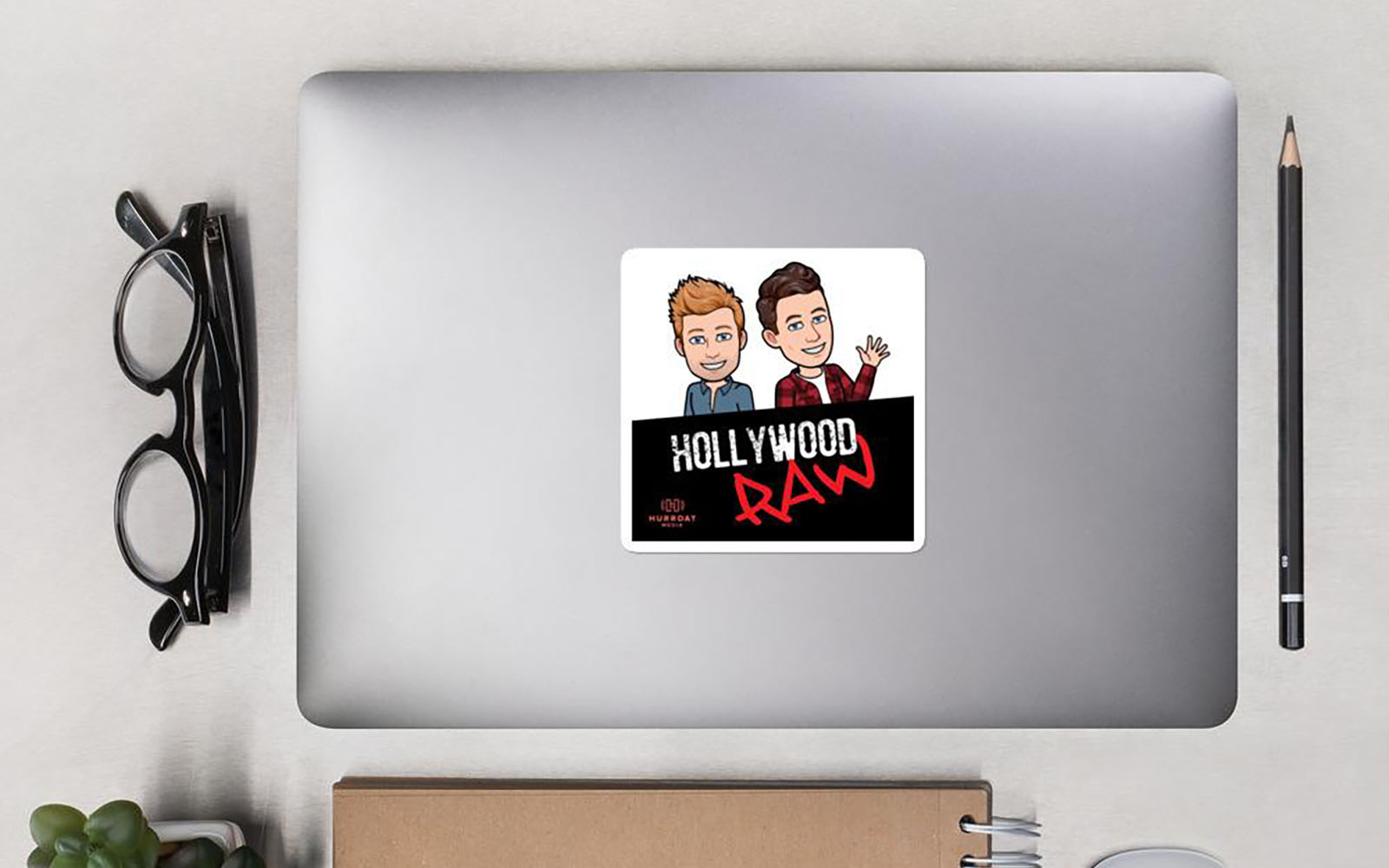 Hollywood Raw Podcast Sticker on a laptop